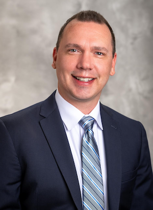 Aaron Mickelson, DO, MPH, MHM Chief Medical Officer