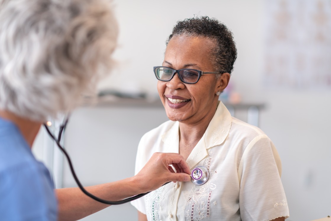 patient going through check up with cardiologist 
