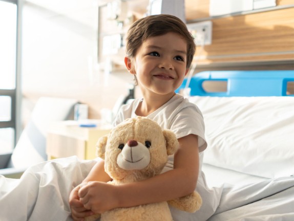Young boy in hospital bed