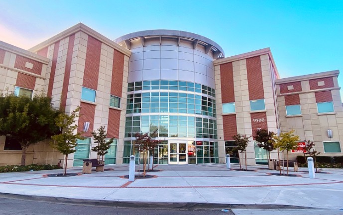 Building with circular glass window entrance