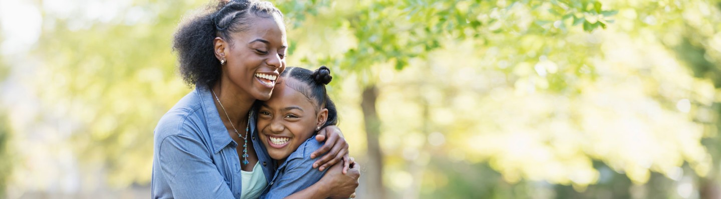 Mom and daughter hugging