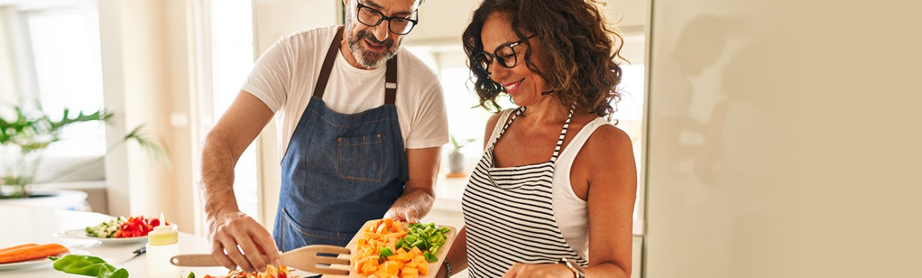 Man and woman cooking in the kitchen