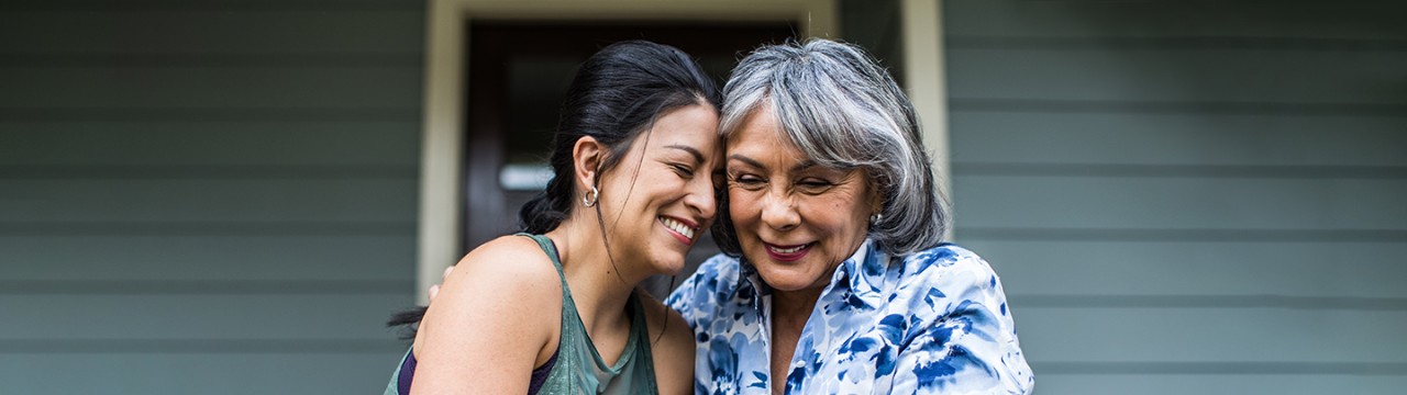 2 women hugging each other