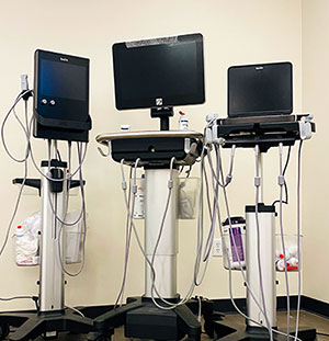 Three ultrasound equipment items.