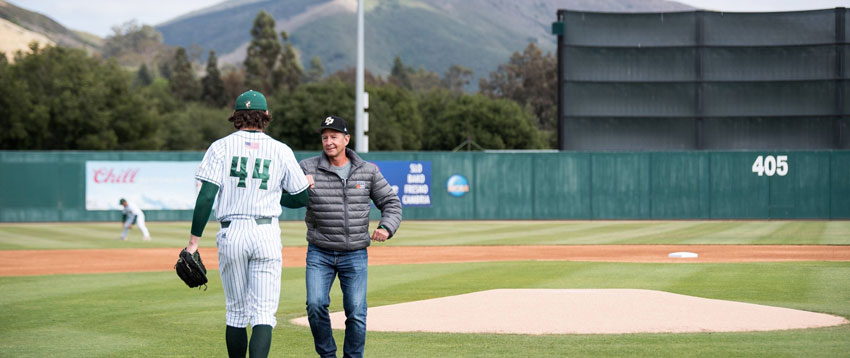 Erik Justesen, Chair of the FHMC Foundation Board, throws out first pitch